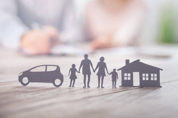 Insurance protecting family health live, house and car concept. Insurance protecting family health live, house and car concept. Cut elements from paper that symbolize the coverage. household insurance stock pictures, royalty-free photos & images