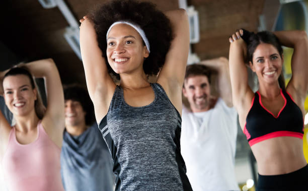 istock Team workout in gym to reach goals 1199059473