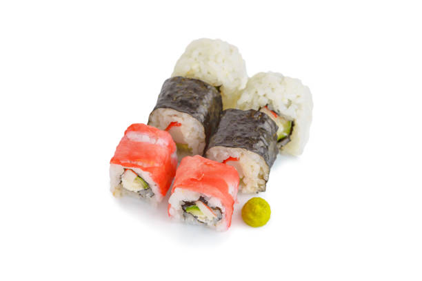 istock Rolls on a white isolated background, close-up. Japanese restaurant menu 1199060321