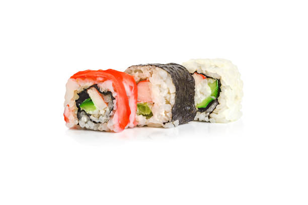 istock Rolls on a white isolated background, close-up. Japanese restaurant menu 1199060322