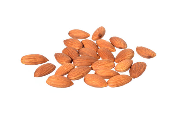 istock Tasty almonds nuts isolated on white background 1199061763