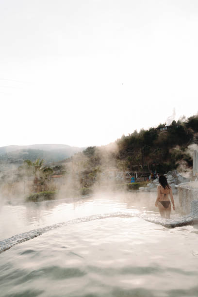 istock Young women in thermal pool 1199065278