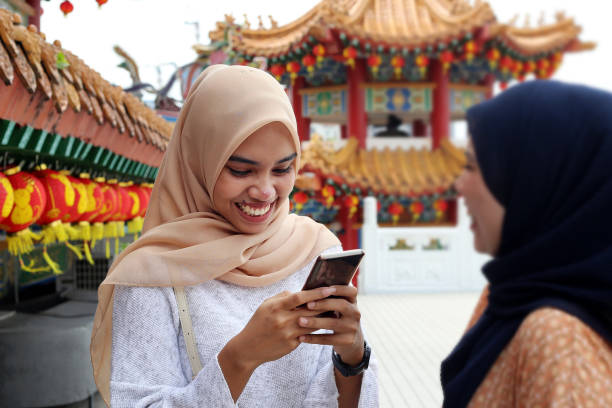 istock Chinese New Year: Modern Muslim in Thean Hou Temple 1199065663