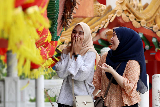 istock Chinese New Year: Modern Muslim in Thean Hou Temple 1199065730