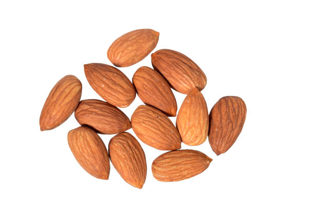 Tasty almonds nuts isolated on white background