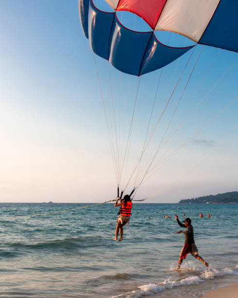 Parasailing is one of the leading watersports attraction in Phuket, Thailand