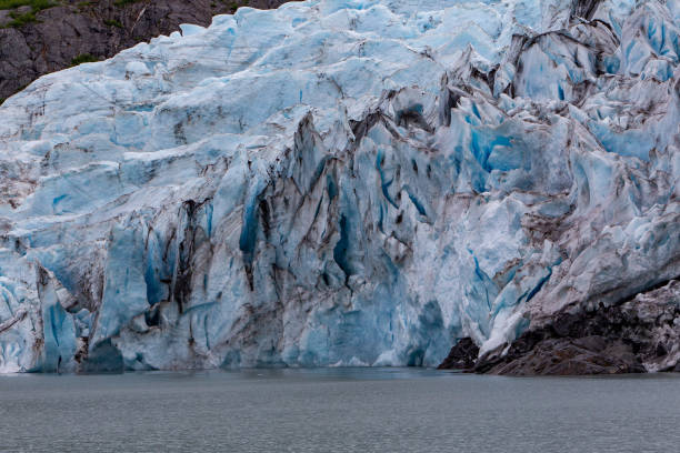 istock Blue and white ice of Portage Glacier 1199067810