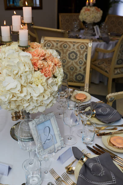 istock The luxury, elegant wedding reception table arrangement. 1199067916