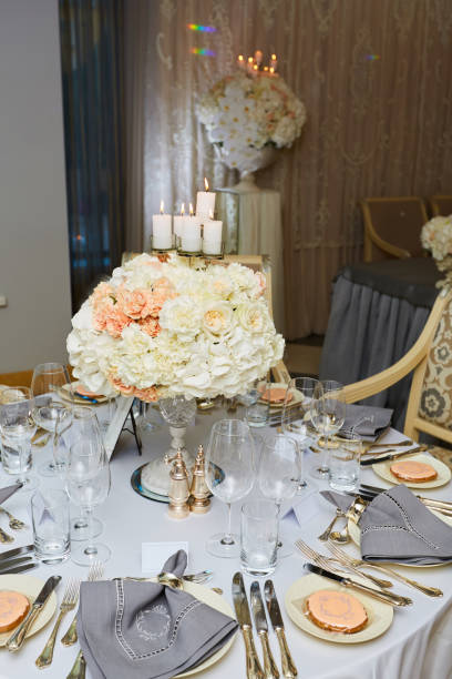 istock The luxury, elegant wedding reception table arrangement. 1199067917