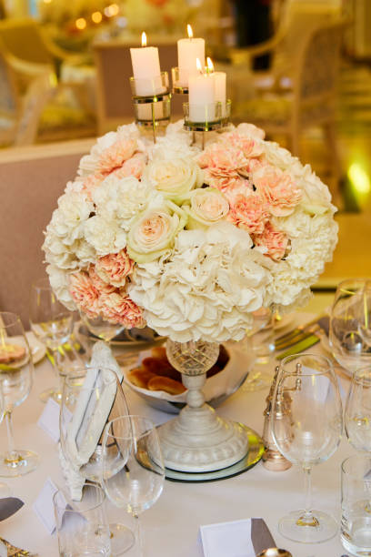 istock The luxury, elegant wedding reception table arrangement. 1199067942
