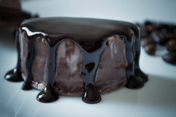 istock Decorated chocolate cake on plate decorated with toping 1199076877