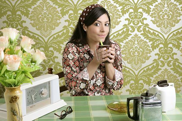 Young woman drinking tea in a cafe.