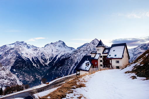 View on alpine village and mountain range, Les deux Alpes. French Alps, Isere department in winter time. Popular ski and winter sport destination
