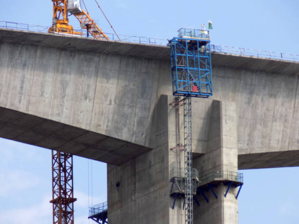 istock Construction of a bridge across the canyon 1199083240