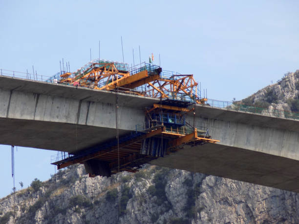 istock Construction of a bridge across the canyon 1199083242