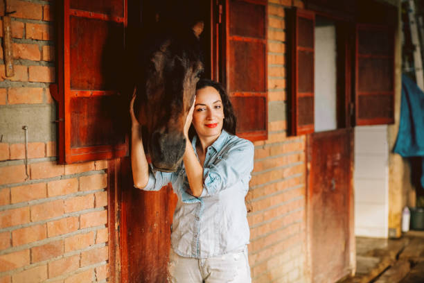istock Young woman and horse 1199083416