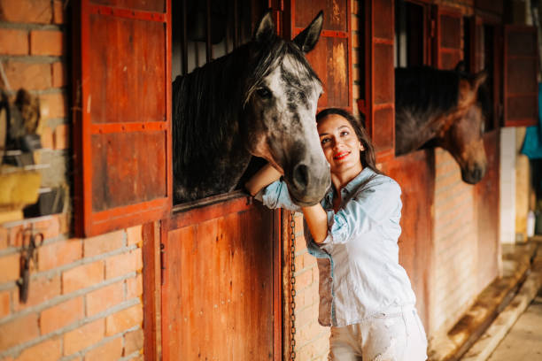 istock Young woman and horse 1199083474