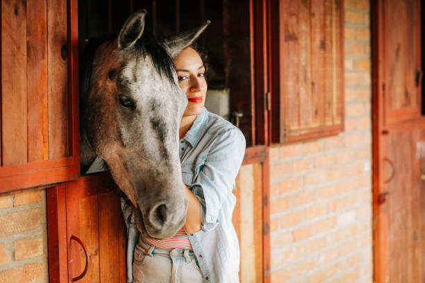 istock Young woman and horse 1199083475