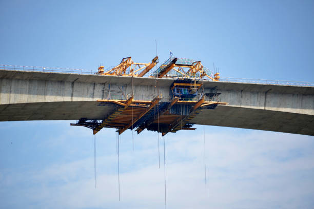 istock Construction of a bridge across the canyon 1199086733