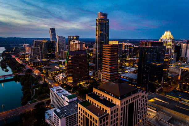 istock Night time aerial drone view above Austin Downtown 1199090663