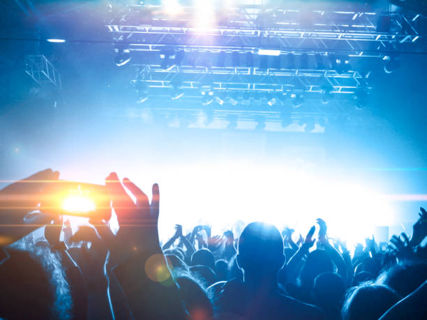 istock Filming concert on smart phone 1199091576