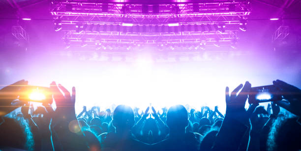istock Filming concert on smart phone 1199091577