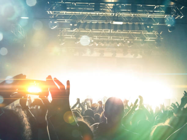 istock Filming concert on smart phone 1199091587