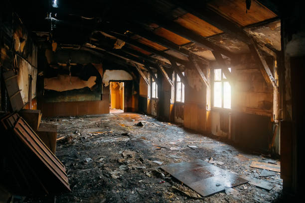 istock Burned interiors after fire in industrial or office building. War or fire consequences concept 1199093739