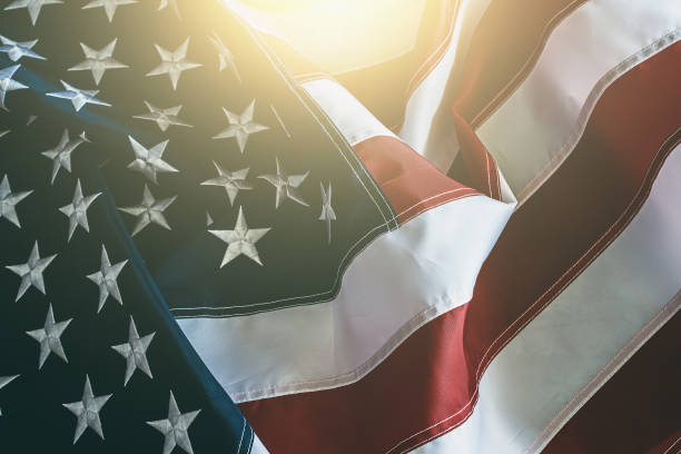 istock USA flag background. American flag in sunlight with copy space for text 1199096026