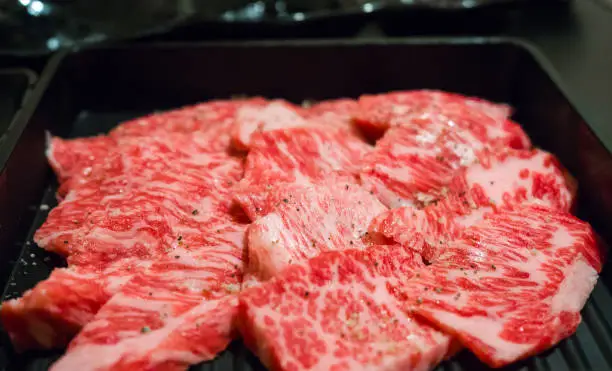 Japanese raw kobe beef on black background