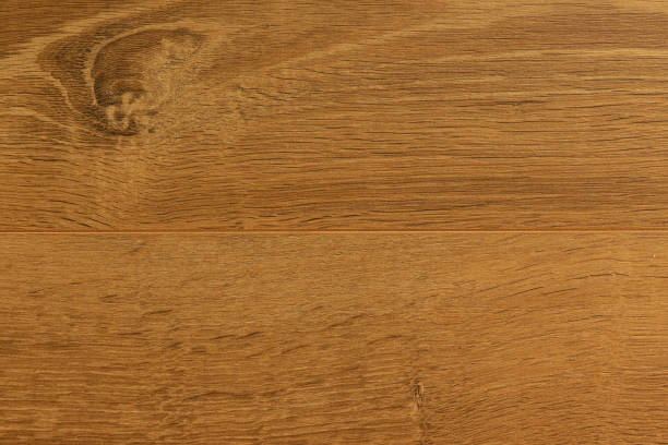 istock Top view of light brown alder laminate 1199096956