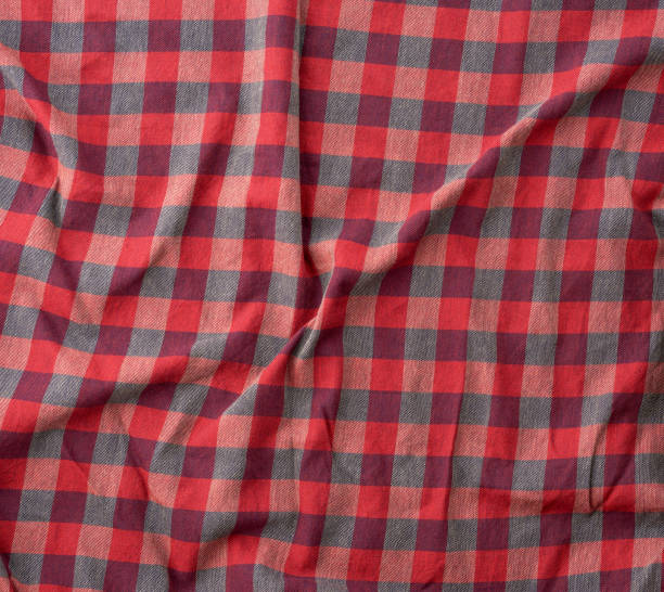 istock red checkered fabric for sewing various clothes with waves 1199097746