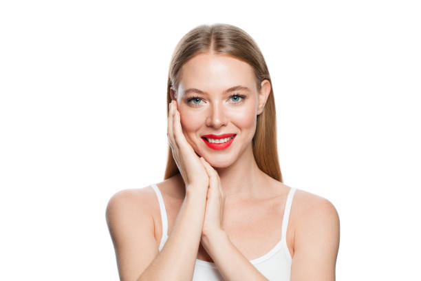 istock Young woman smiling isolated on white background. Healthy model 1199099887