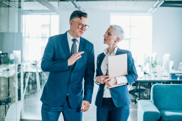 istock Business partners in discussion 1199100461