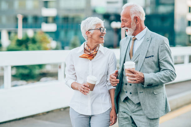 istock Business persons walking outdoors. 1199100485