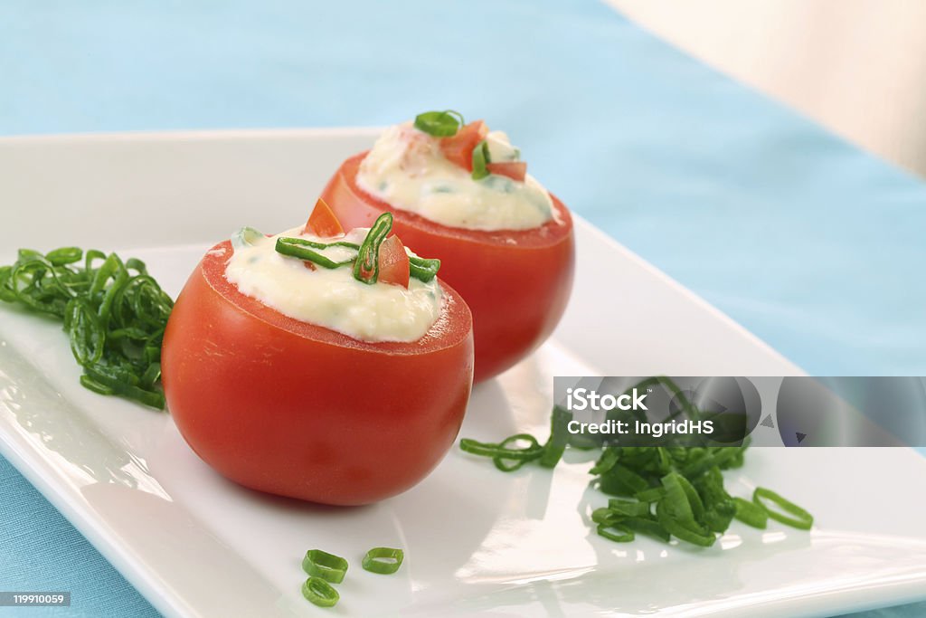 Tomates rellenos - Foto de stock de Tomates rellenos libre de derechos