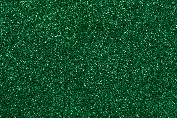 istock green diamond powder abstract background 1199100989