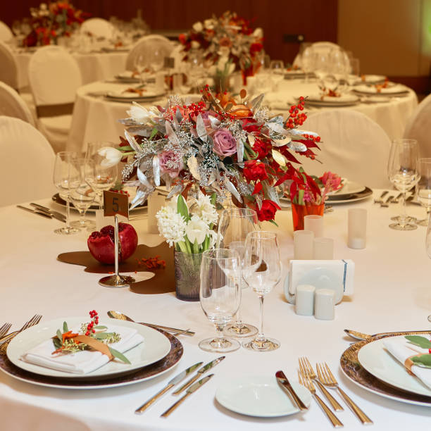 istock catering table set service with silverware, napkin and glass at restaurant before party 1199103327
