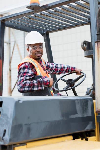 istock African-American man operating forklift 1199107340