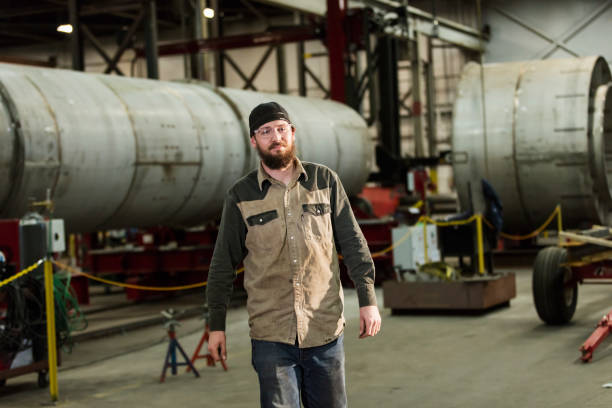 istock Worker in metal fabrication shop 1199108246
