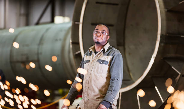 A guy stood at the end of a tunnel