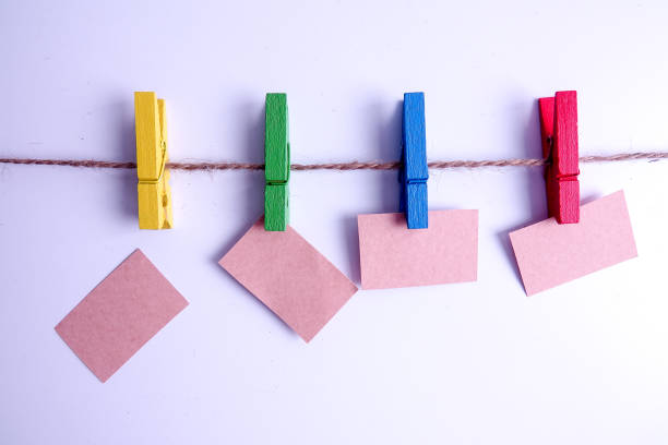 istock Colorful clothespins isolated on a white background. 1199112397
