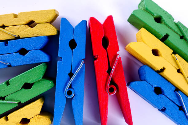 istock Colorful clothespins isolated on a white background. 1199112431