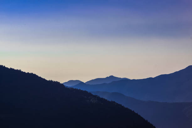istock Snow-covered Mountain With Blue Sky, Cloud and Fog 1199116185