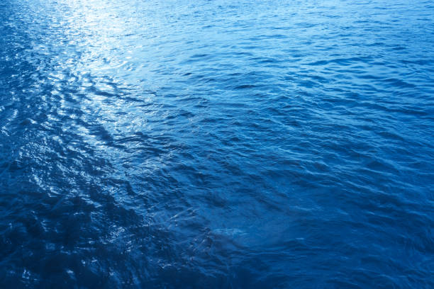 istock Blue sea wave close up, low angle view for summer background. 1199117388