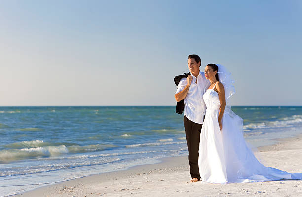 istock Bride & Groom Married Couple at Beach Wedding 119912740