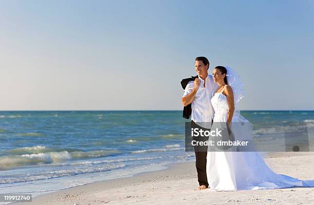 Bride Groom Married Couple At Beach Wedding Stock Photo - Download Image Now - Beach, Wedding, 30-39 Years