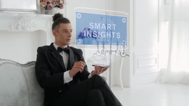 Young man uses hologram Smart insights