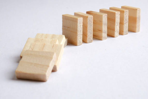 istock Domino effect isolated on white background 1199132251