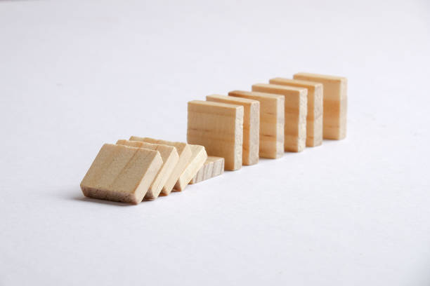 istock Domino effect isolated on white background 1199132254
